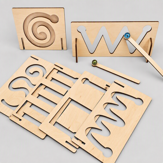 A wooden letter and number learning toy set with laser-cut wooden boards, small wooden dowels, and colorful ball bearings on a light gray background.